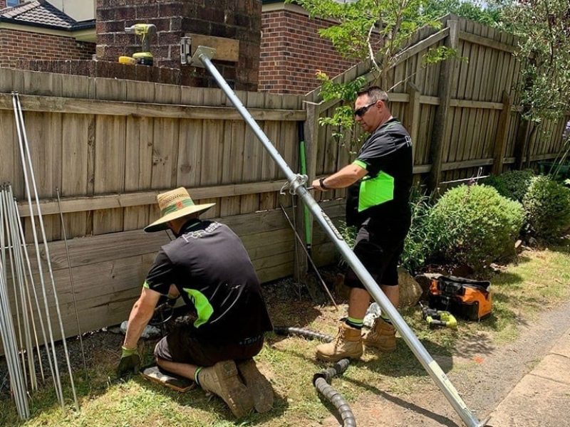 Workers installing structural supports during house subsidence solutions to stabilise and level home foundations.
