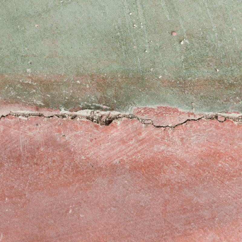 Foundation Repair required for a visible crack along the joint between concrete slab surfaces.